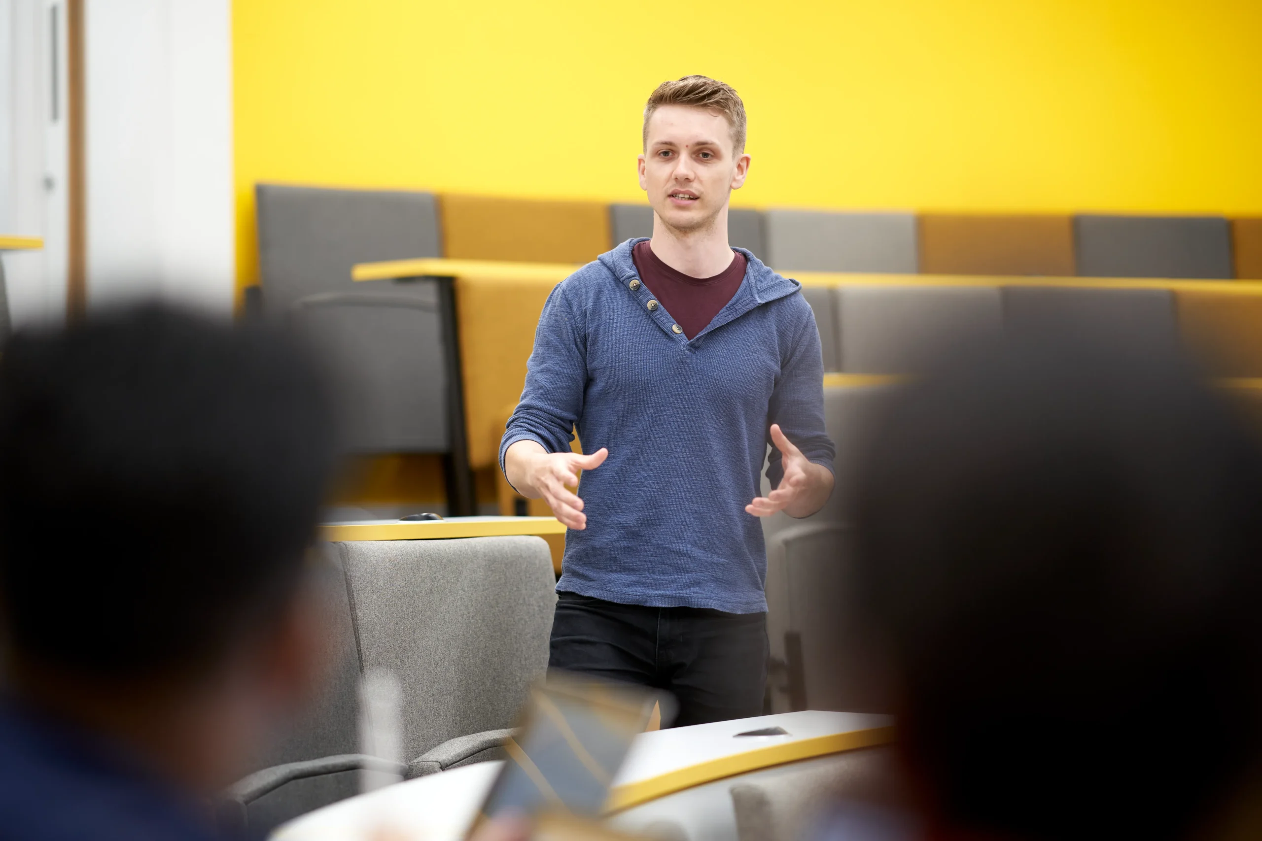 Explore a real-world ransomware attack: DragonForce and the future of cyber defence - Man presenting a lecture to students